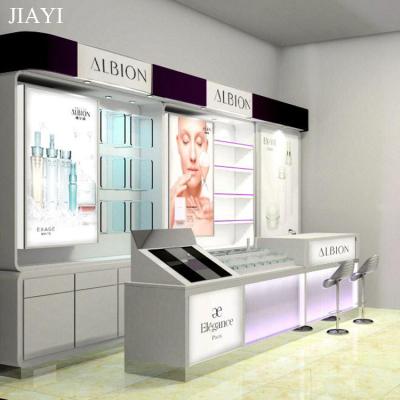 China modern & high quality fashion cosmetic showroom design with cosmetic display racks for sale