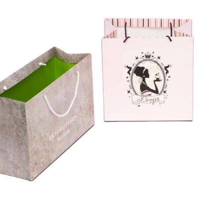 China Wholesale Custom Red White Fashion Jewelry Storage Manufacturer Printing Paper Shopping Bag With Handles for sale