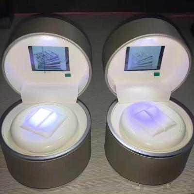 China Fashion Factory Luxury Plastic Jewelry Case Round Wrapping Music Watch Rotating Wedding Led Dancing Light Box for sale