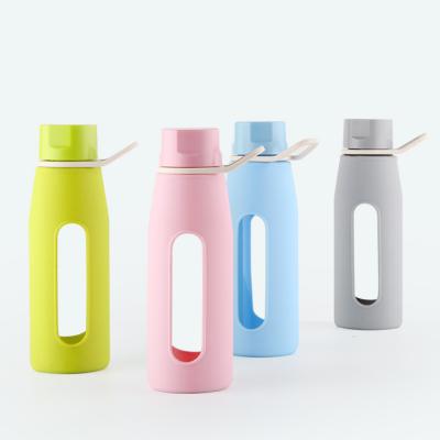 China Sustainable 350ml BPA Free Eco-Friendly Quality Sports Glass Water Bottle With Handle Lid And Strainer for sale