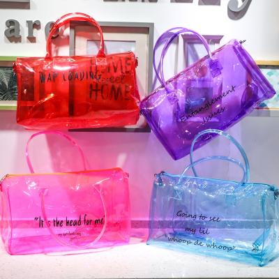 China Clear PVC Custom Gym Bag Overnight Tote Expend One Night Handbag Transparent PVC Colorful Silicone Jelly Make Up Holographic Duffel Bag for sale