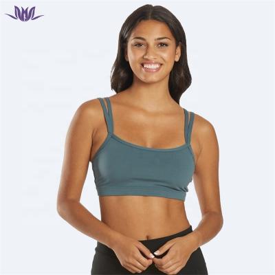 China Breathable high quality sexy backless sports bra solid color fashion fitness yoga running bra for women for sale