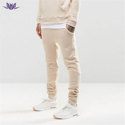 China 2021 Breathable Wholesale Men's Sportswear Manufacturer White Men's Taper Jogger Pants Sweatpants Tapered Slim Fit for sale