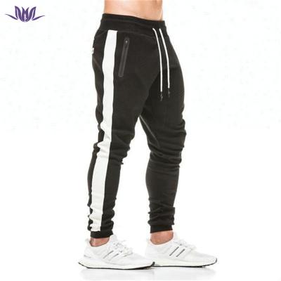 China 2021 Anti-wrinkle adults sports slim fit jogger pants men custom empty jogger with stripe for sale