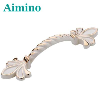 China AIMINO Kitchen Furniture Handle Modern European Style Ivory White Ivory Handle Wardrobe Cabinet Handle for sale