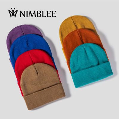 China Winter women men pure color warm classics ski velvet cuff hat beanie with custom logo for sale