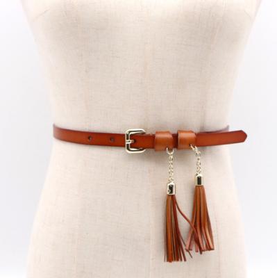 China Cowhide Fashion Skinny Leather Belt With Tassels for sale