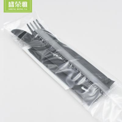 China PS Knife Fork Spoon Disposable Heavy Plastic Cutlery Set With Napkin In OPP Bag Custom Logo for sale