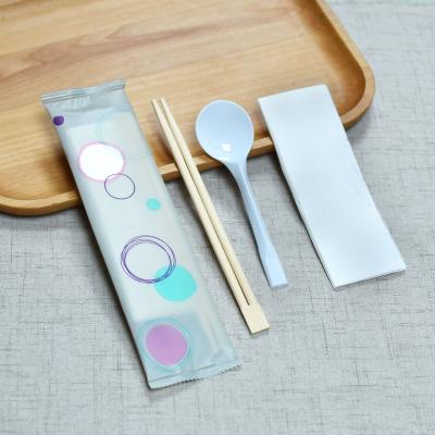 China Disposable Disposable Cutlery Set Chopsticks Spoon Napkin Set For Restaurant Take Out Cutlery Customized Logo for sale