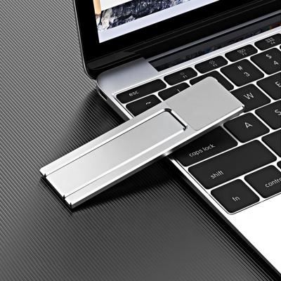 China Multifunctional Adjustable Magnet Expansion Aluminum Alloy Stand Holder Foldable Phone Laptop Bracket for sale