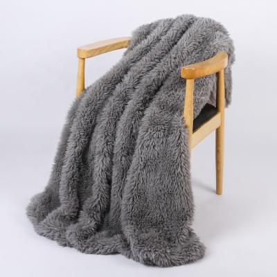 China Anti-pilling custom knit designer double layer plush faux long fur blanket for sale with logo for sale