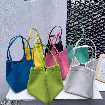 China 2021Lightweight Treading First Lay Designer Women Handbags Ladies Goatskin Bucket Bags for sale