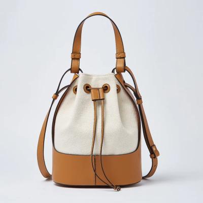 China Wholesales Girls Canvas Backpacks Genuine Leather Drawstring Backpacks Waterproof Patchwork Bucket Bags Daily for sale