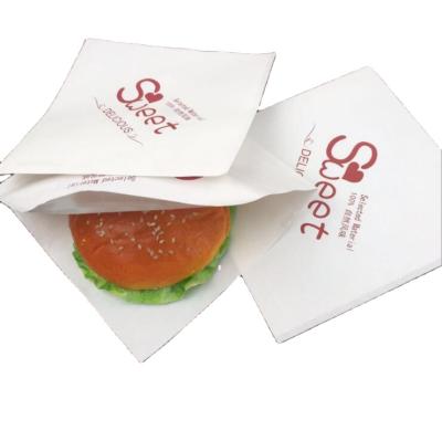 China Custom Carry Baking Greaseproof Paper Bags Donut Cookies Sandwich Triangle Disposable Food Snack Bag Packaging Custom for sale