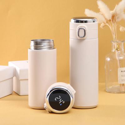 China 2021 PORTABLE New Design Customized Mugs With Cup 304 Stainless Steel Cute Innovative Vacum Flask Mini Water Bottle for sale