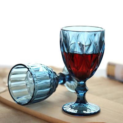 China Modern Wholesale Colored Glassware Colored Goblet Wine Glasses Water Glass Vintage Pressed Blue Glass Goblets zu verkaufen