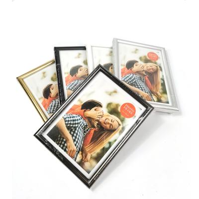 China Plastic Cheap Decorative Photo Frame Decoration Manufacturing Family Photo Frame for sale