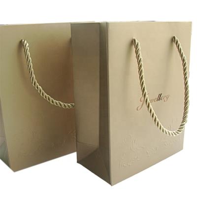 China Recyclable Gift Small Logo Paper Packaging With Handles Custom Kraft Paper Bags Jewelry Shopping Paper Bag Christmas Gift for sale