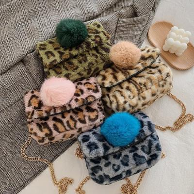 China Fashion New Winter Fashion Women's Plush Chains Bags Leopard Pompom Ball Fur Shoulder Cross - Body Bag For Ladies for sale