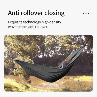 China 2021 Bestselling Portable and Lightweight Tarpaulin Nylon Outdoor Camping Swings Durable Hammock Stuff Parachute Hammock for sale