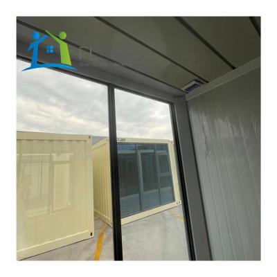 China Modern Portable Cabin Modula Lxuruy Shipping Container Glass Wall Garden Mobile Prefab Movable Living One Way Office Building for sale