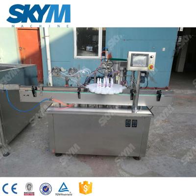 China Automatic Star wheel Type Nasal Spray Bottle Dispenser Capper Liquid Filling Capping Machine for sale