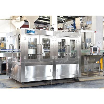 Cina 2300*1680*2650mm Automatic Juice Filling Machine 3000-28000BPH Stainless Steel in vendita