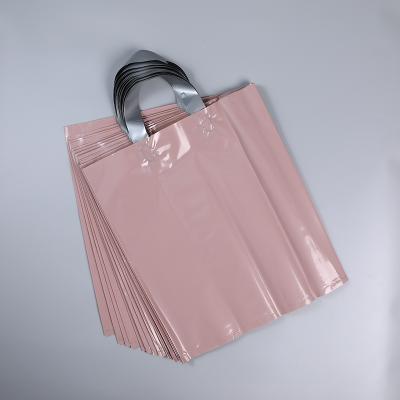 China Recyclable Custom Logo Plastic Pink Shopping Bags For Clothing for sale