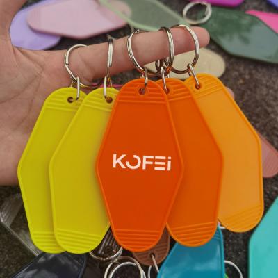 China Durable wholesale custom made hotel promotional acrylic motel vintage retro motel key chain white hotel keychains Kofei key chain for sale