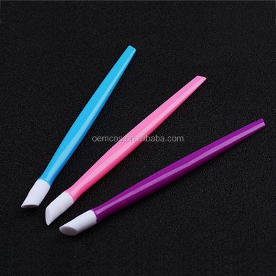 China Nail Polish Remover Colored Handle Nail Art Tool Cuticle Pusher Rubber Hard Slanted Plastic Remover for sale