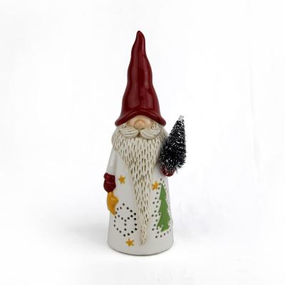 China Sustainable Ceramic Gnome Statue HoldsTree Christmas Gnome Ornament with LED LIGHT for sale