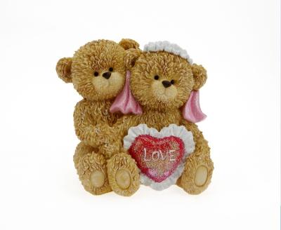 China Wholesale Personalized Resin Teddy Bear Figurine Holding A Valentine's Heart Teddy Bear for sale