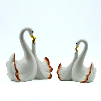 China Europe Spring Ceramic Swan Couple Figurines Couple Ceramic Swan For Home Decor for sale