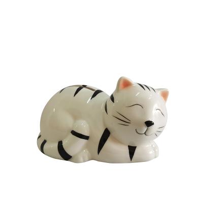 China Ceramic Funny Cartoon Tiger Lies Napping On The Ground Coin Bank, Money Saving Box For Kids Gifts for sale