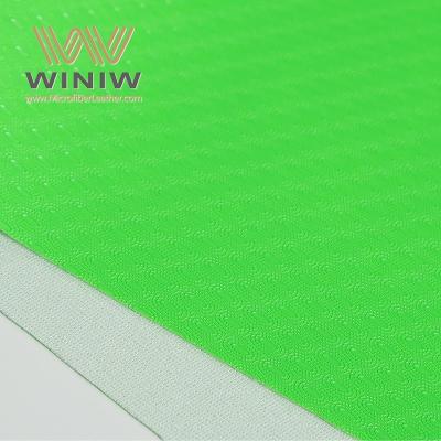 China Color verde Cuero de micro fibra Materiales veganos Cuero artificial para el fútbol en venta