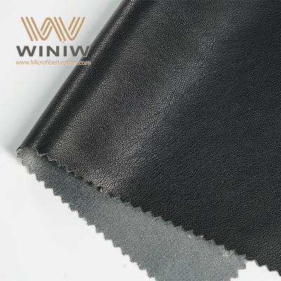 China Couro sintético de imitação de micro PU altamente elástico para fabricação de vestuário à venda