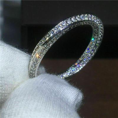 China Huitan CLASSIC Exquisite Eternity Wedding Band Bridal Silver Plated Inlaid One Row Round Diamond Engagement Women Rings for sale