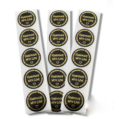 China Anti-counterfeit custom printed round paper packaging label bottle brand logo roll waterproof adhesive paper label stickers for sale