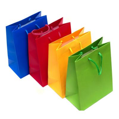 China Recycled Materials Custom Printed Your Own Logo Color Gift Craft Shopping Paper Bag With Handles for sale