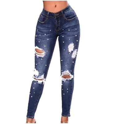 China Color Fade Proof DiShang Jeans Manufacturer Custom Logo Jeans Women Skinny Ripped Beaded Jeans for sale