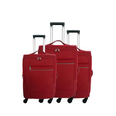 China Red Cheap Pull Rod Travel Women Luggage Bags, Hot Rolling Cloth Travel Trolley Bag Luggage for sale