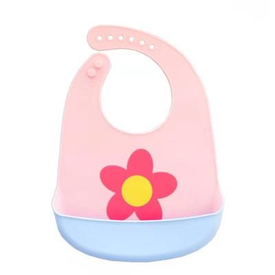 China Lovely Waterproof Antibacterial Kids Cartoon With Food Catcher Soft Silicone Feeding Bibs for sale