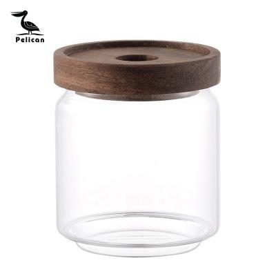 China Freshness Preservation Round Borosilicate Glass Food Spice Storage Container With Bamboo And Wooden Lid for sale