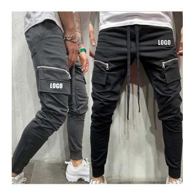 China Anti-Wrinkle Custom Made Men Track LOGO Free Pants Pocket Man Stacked Tracker Cargo Stacked Sweatpants Men for sale