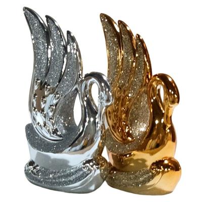 China 100% Handmade Elegant luxury home decor art sculpture resin goose statue gold silver swan figurines wedding table centerpiece decoration gifts for sale