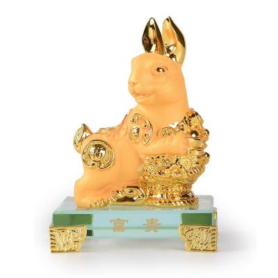 China Worlwide Chinese Zodiac Sculpture Glass Base Home Office Table Decor Figurine Gift Resin Frosted Golden Rabbit Feng Shui Zodiac Statue for sale