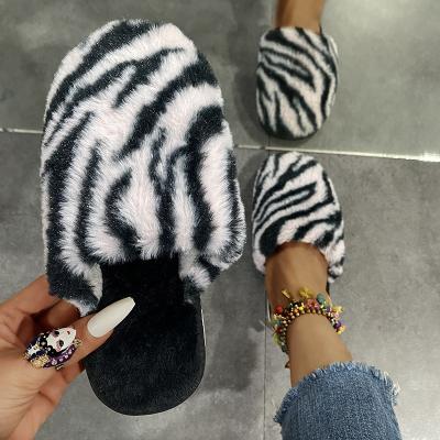 China Wholesale Fashion Trend Zebra Pattern Flat Furry Slippers Shape Style Soft Sole Closed Toe Slides Fluffy Slippers For Women for sale