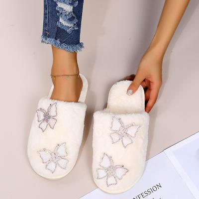 China Fashion Trend New Arrival Closed Toe Fluffy Home Slippers For Women Fall Warm Furry Slides Diamond Butterfly Pattern Fur Winter Cotton Sandals for sale