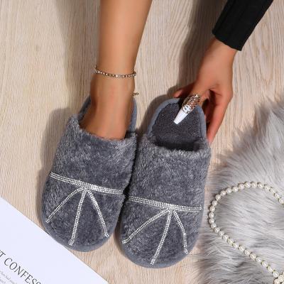 China Fashion Trend Winter Fur Flat Slippers For Women Solid Color Casual Fluffy Slippers With Diamond Ladies Furry Warm Sandals Slippers for sale