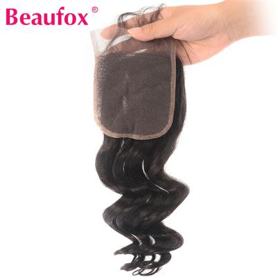 China Brazilian Loose Wave Beaufox Loose Wave Hand Tied Medium Brown Swiss Baby Hair Prepared 4*4 Free Part Remy Human Hair Lace Closure for sale